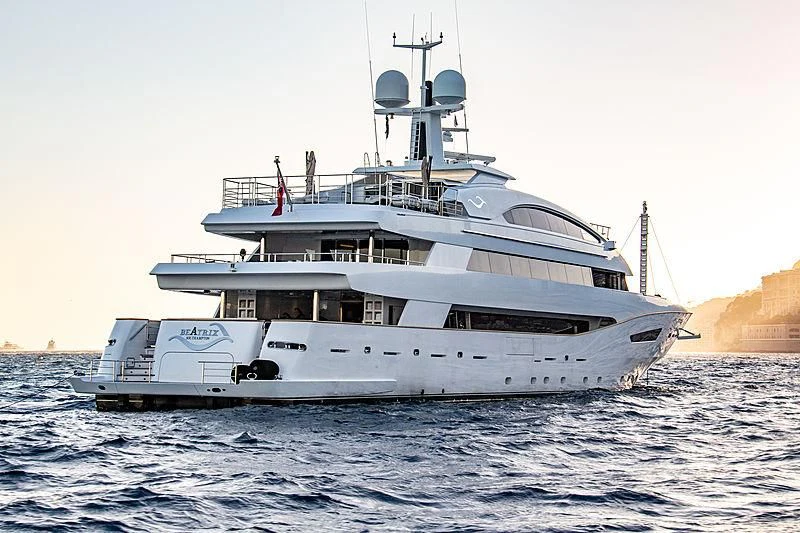 a white boat on the water aboard BEATRIX Yacht for Sale