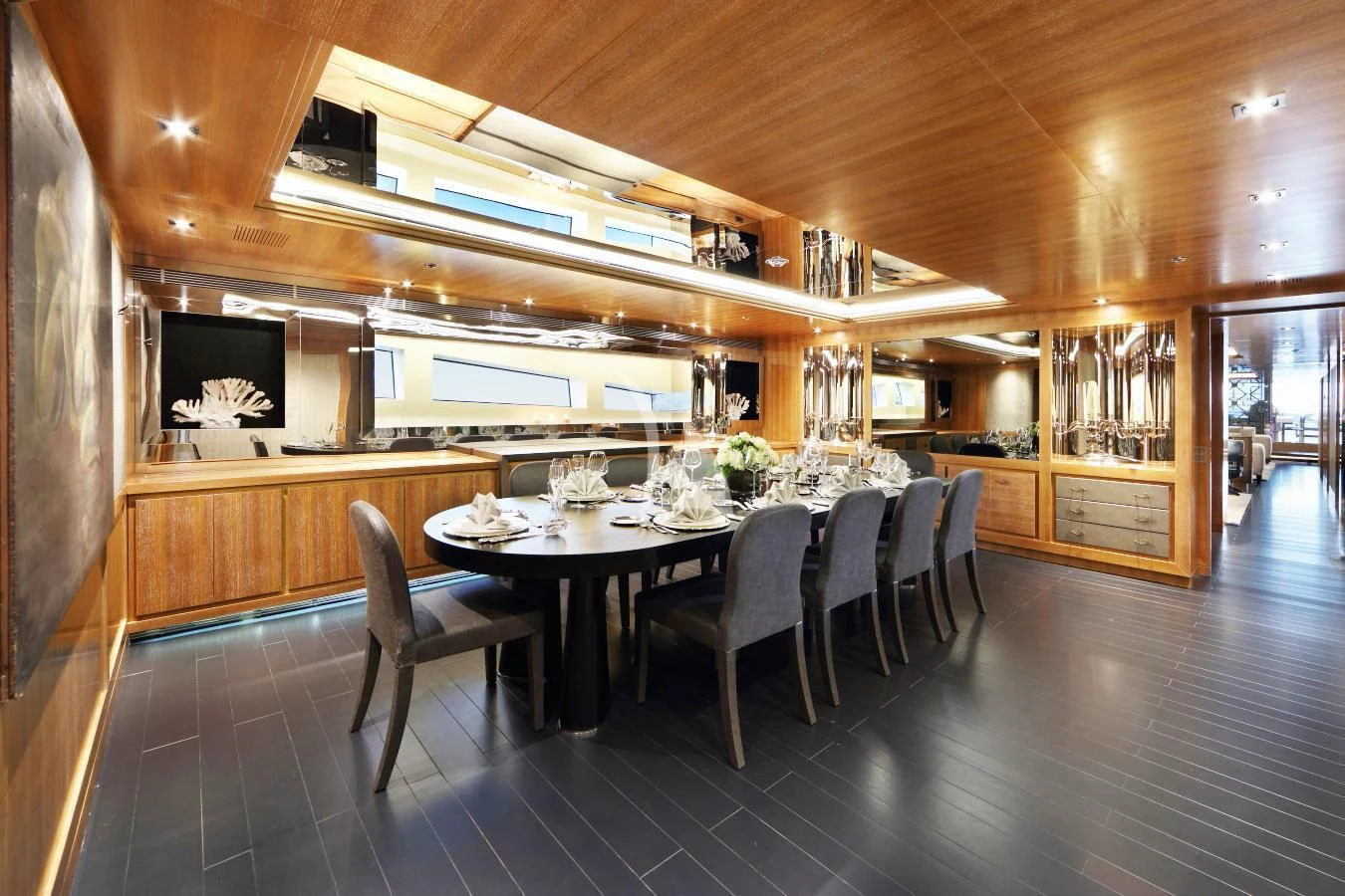 a large dining room with a table and chairs aboard BEATRIX Yacht for Sale