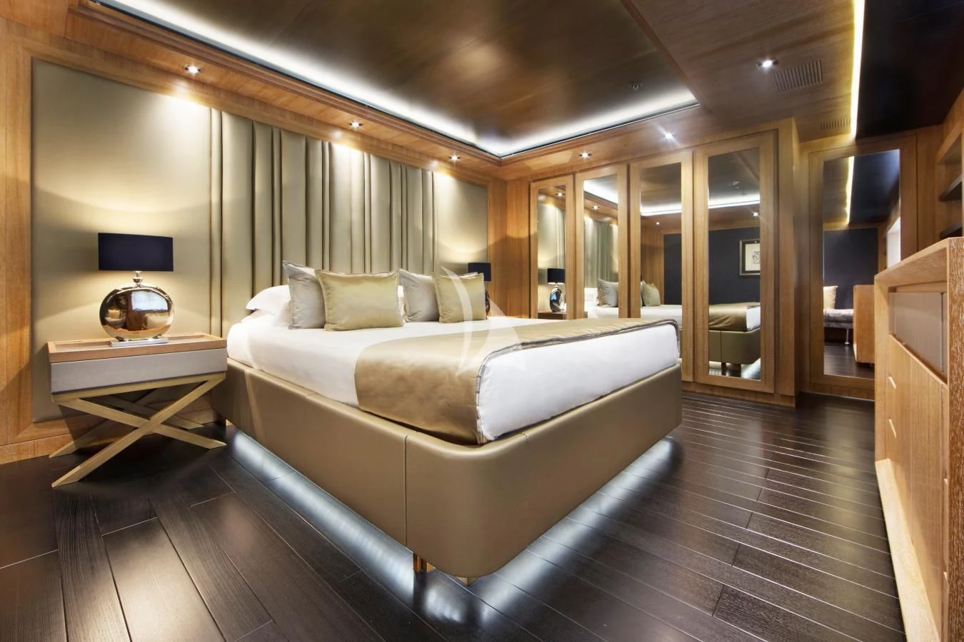 a large bed in a room aboard BEATRIX Yacht for Sale