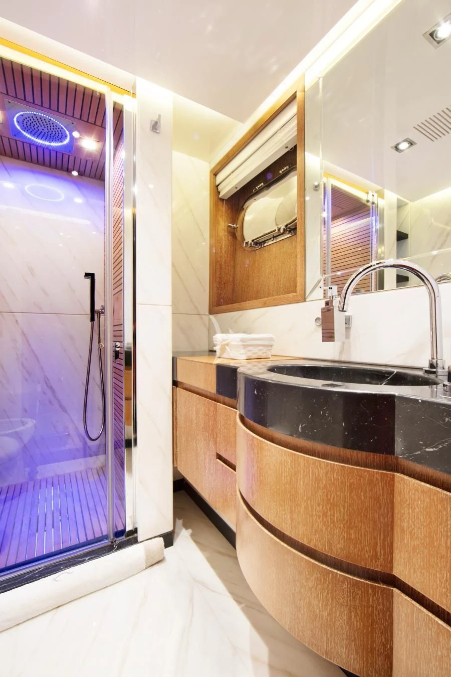 a bathroom with a sink and a mirror aboard BEATRIX Yacht for Sale