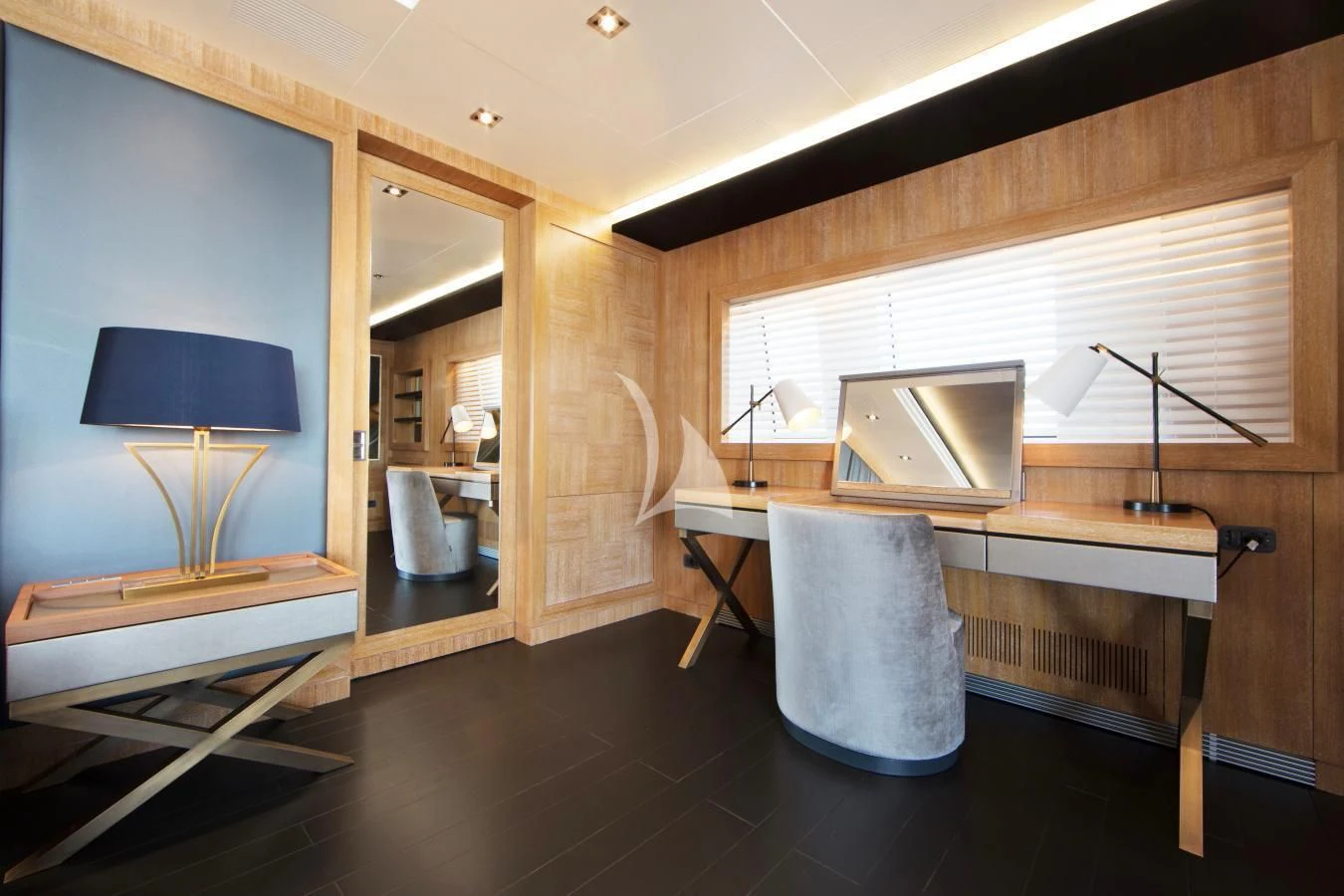 a room with a desk and a television aboard BEATRIX Yacht for Sale