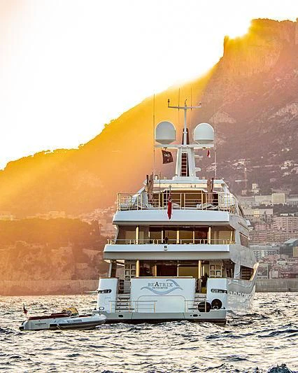 a large white boat on the water aboard BEATRIX Yacht for Sale