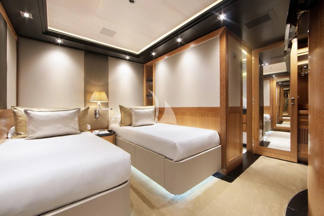 a hotel room with two beds aboard BEATRIX Yacht for Sale