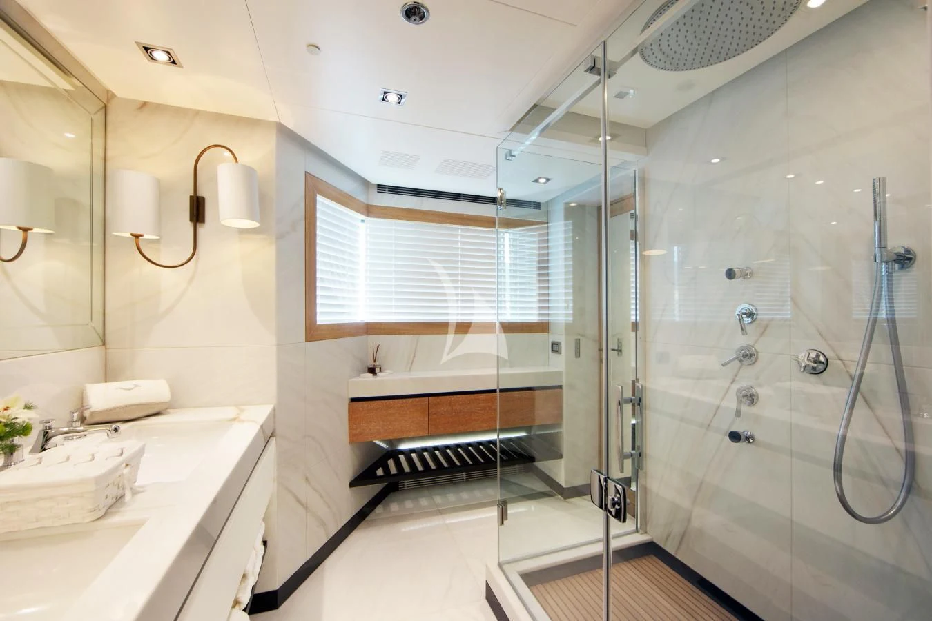 a bathroom with a shower and sink aboard BEATRIX Yacht for Sale