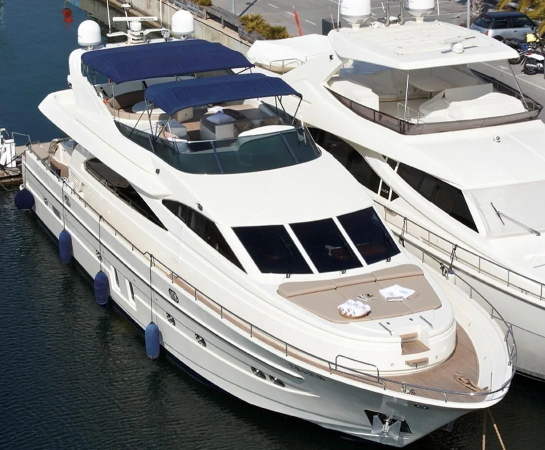 a group of boats in a harbor aboard BARBASILDA Yacht for Sale