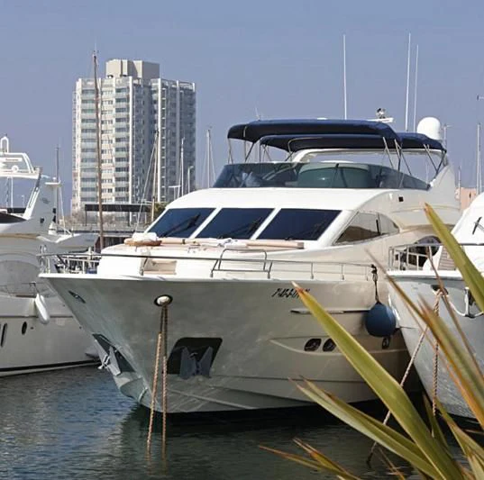 a row of boats in a harbor aboard BARBASILDA Yacht for Sale