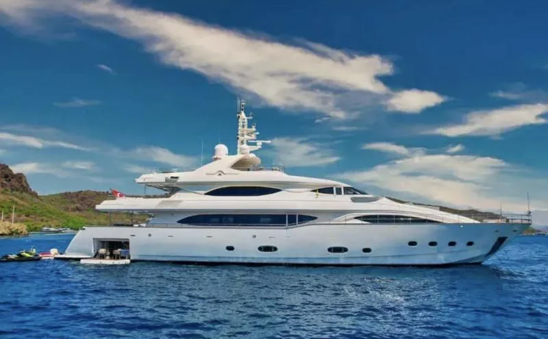 a white yacht in the water aboard ARIELA Yacht for Sale