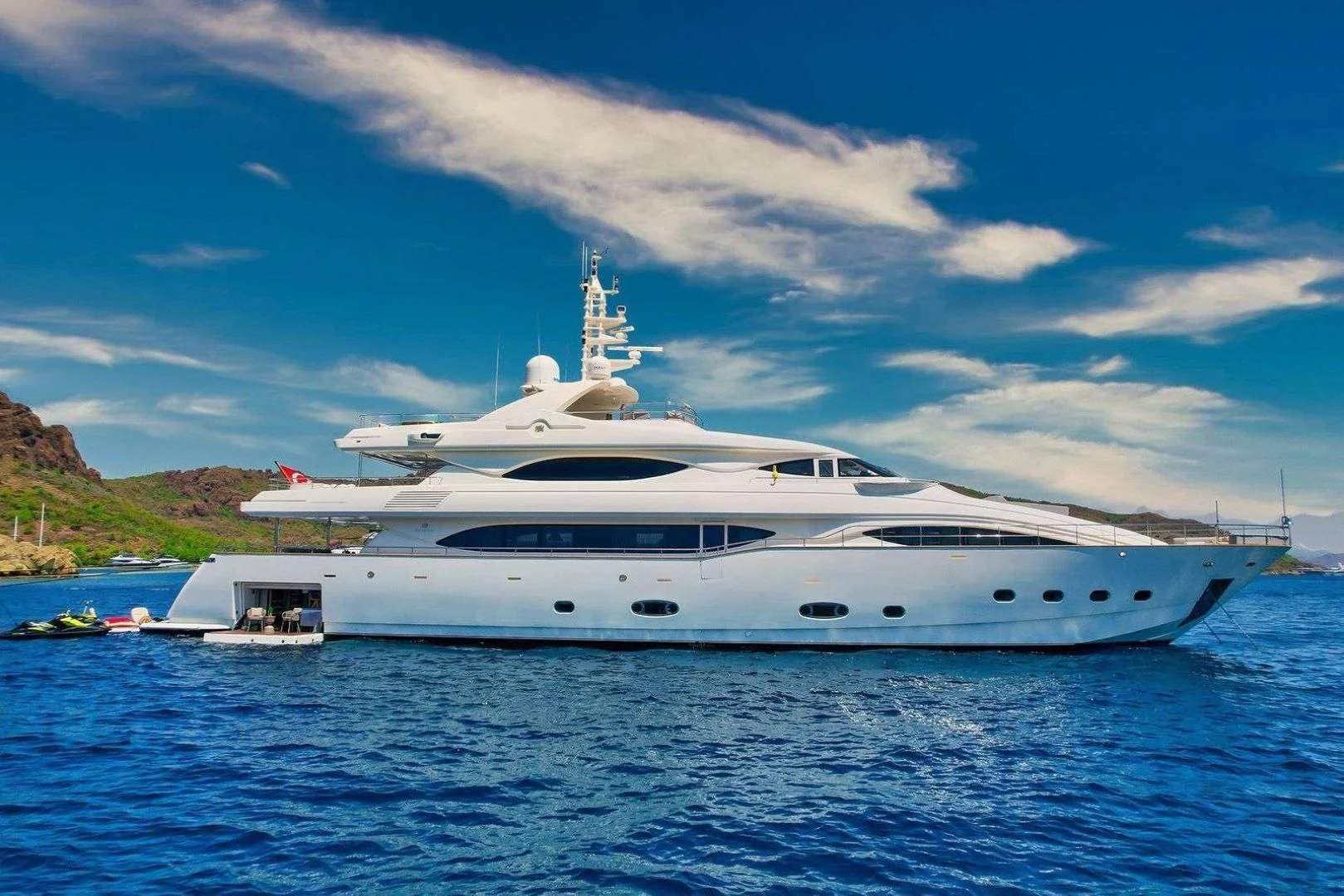 a white yacht on the water aboard ARIELA Yacht for Sale