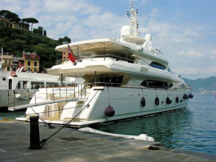 a large white boat docked aboard ARIELA Yacht for Sale