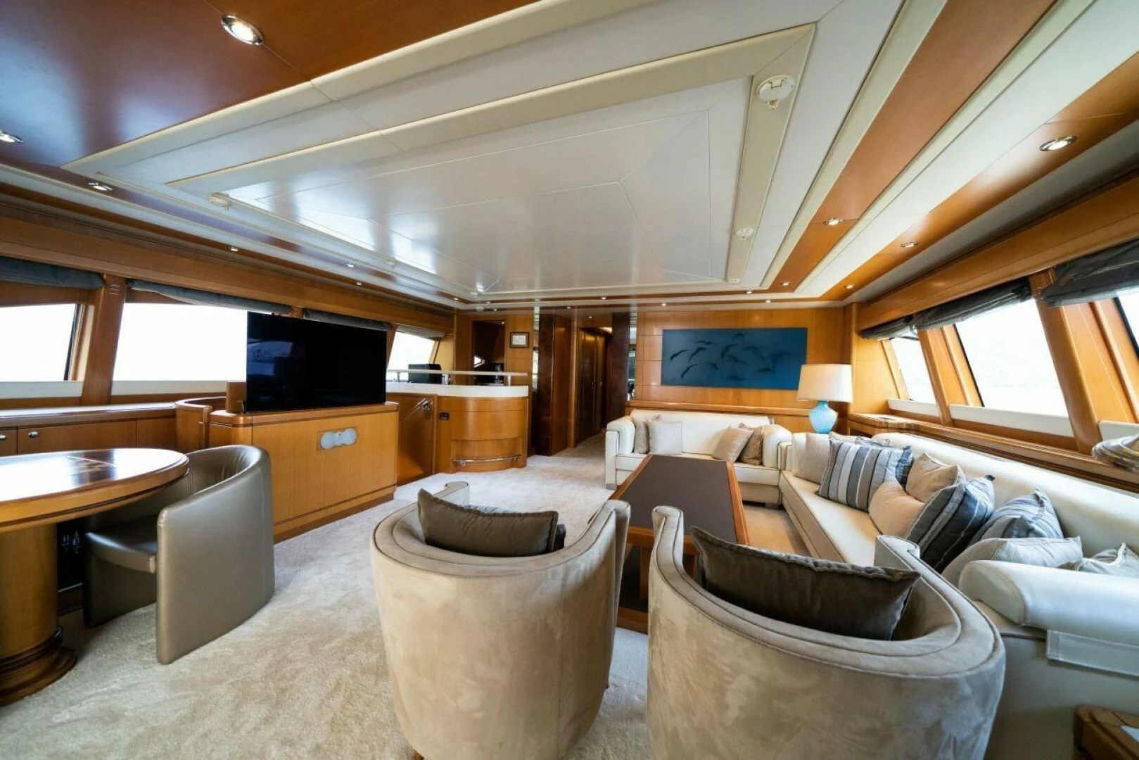 a living room with a large bed aboard ARIELA Yacht for Sale