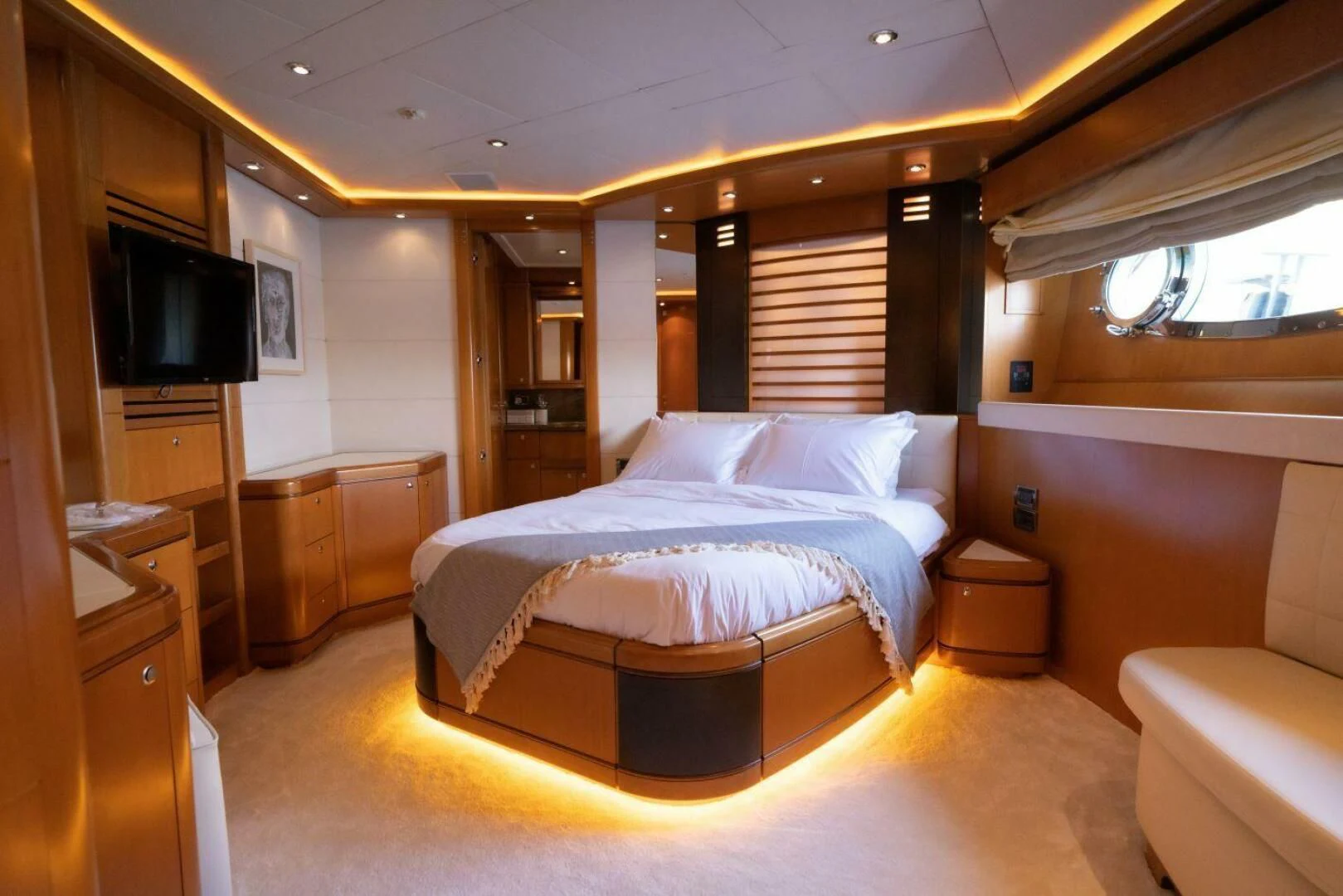 a bed in a room aboard ARIELA Yacht for Sale