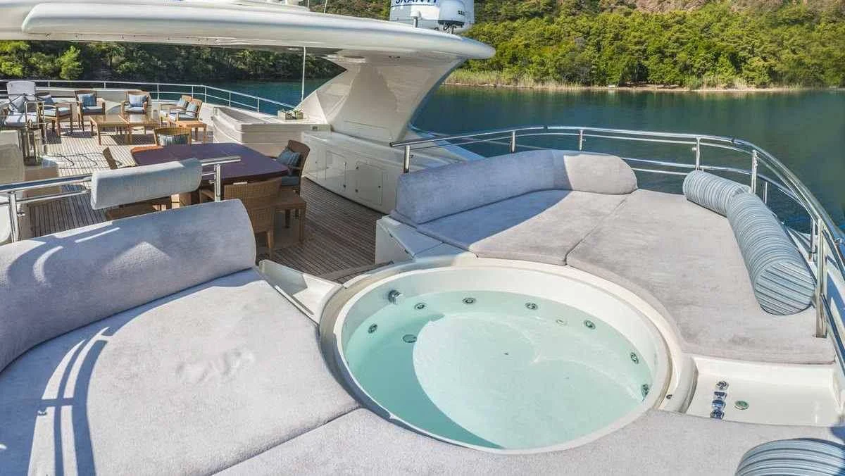 a pool with a person standing on the edge of it aboard ARIELA Yacht for Sale