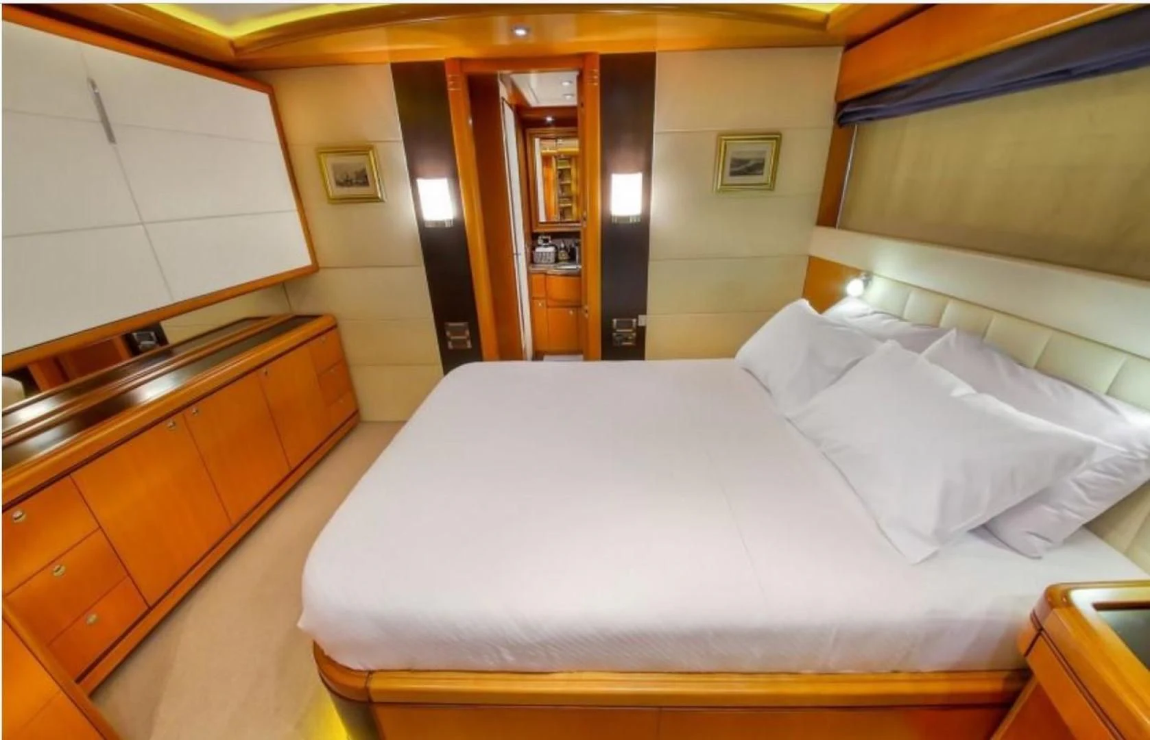 a hotel room with a bed aboard ARIELA Yacht for Sale