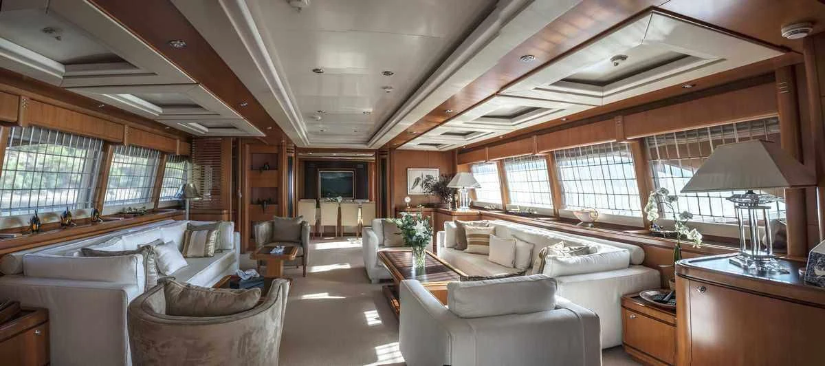 a living room with a large window aboard ARIELA Yacht for Sale