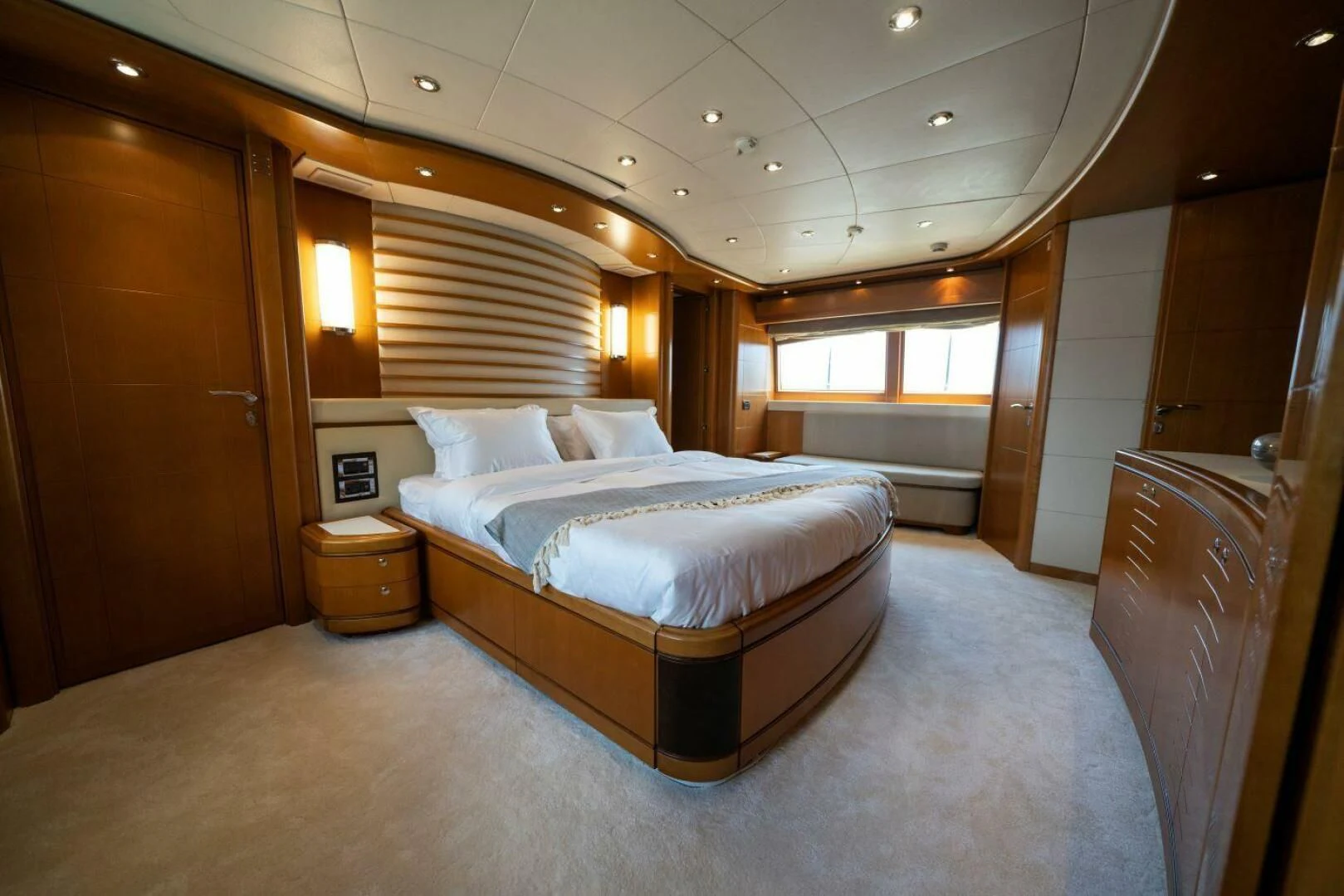 a bed in a room aboard ARIELA Yacht for Sale