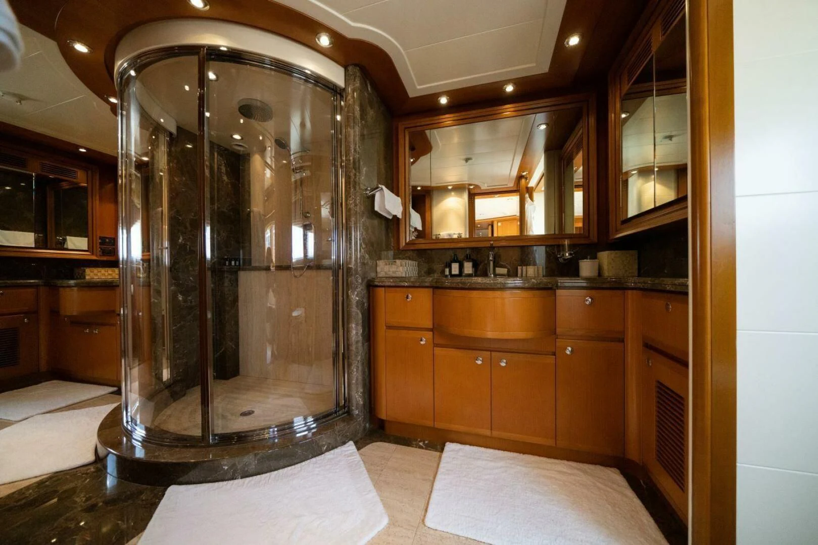 a large glass shower in a bathroom aboard ARIELA Yacht for Sale