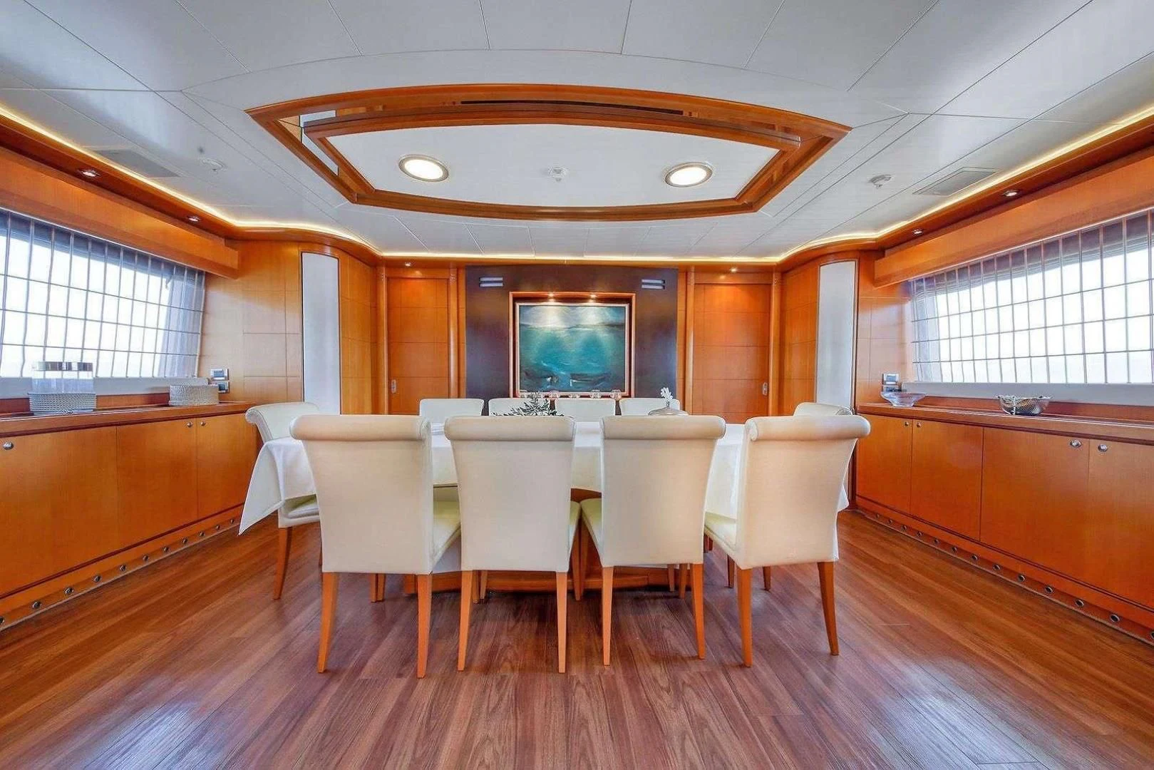 a room with a table and chairs aboard ARIELA Yacht for Sale