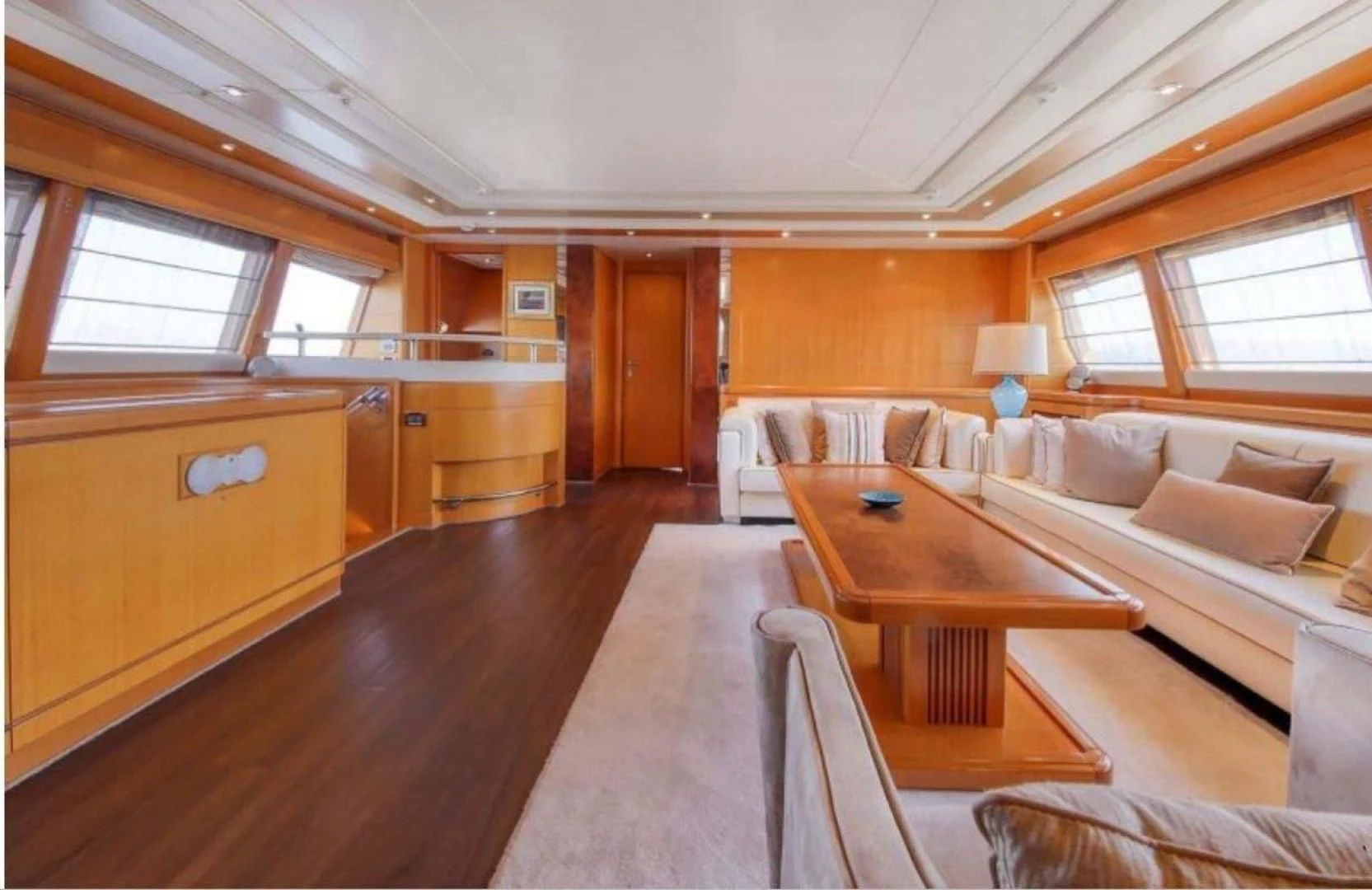 a living room with a couch and a table aboard ARIELA Yacht for Sale