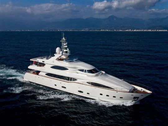 a white yacht in the water aboard ARIELA Yacht for Sale