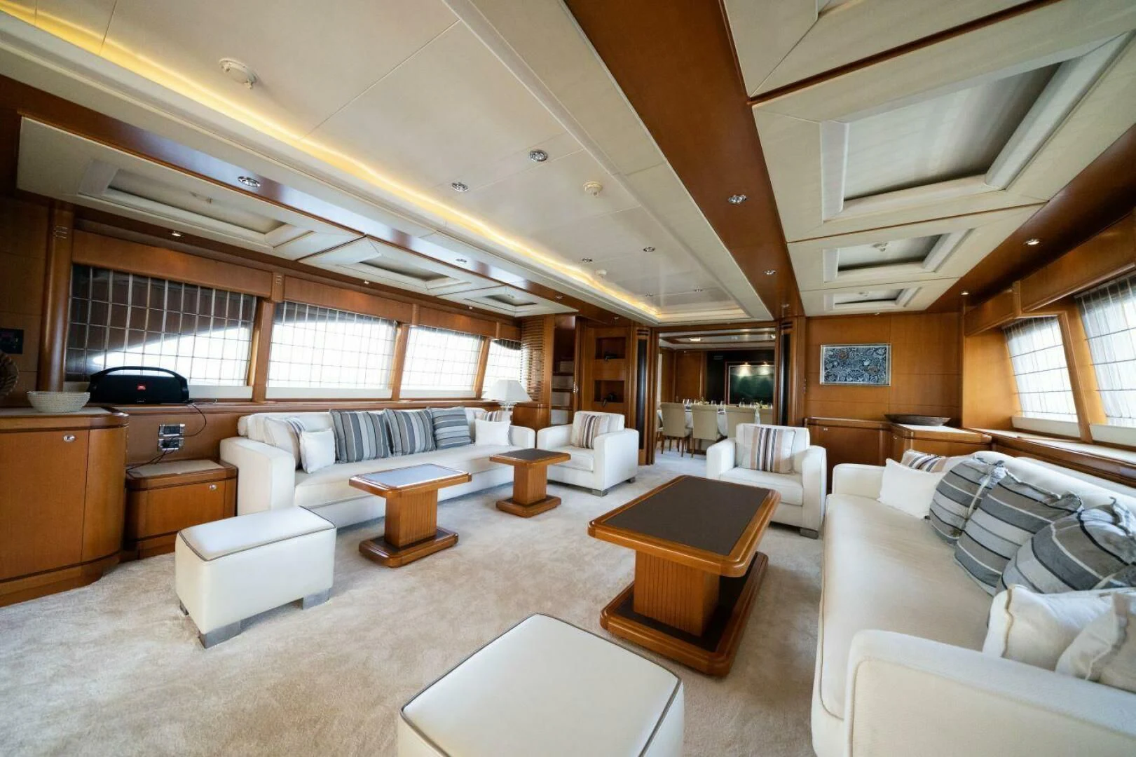 a large living room with a large window aboard ARIELA Yacht for Sale