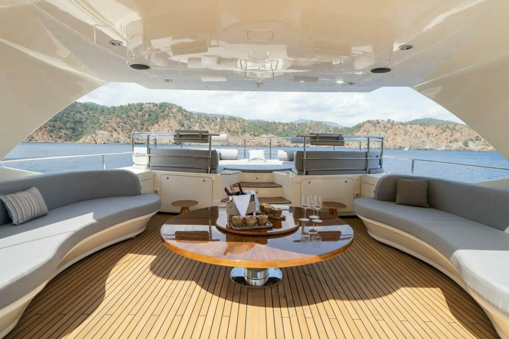 a room with a couch and a table aboard ARIELA Yacht for Sale