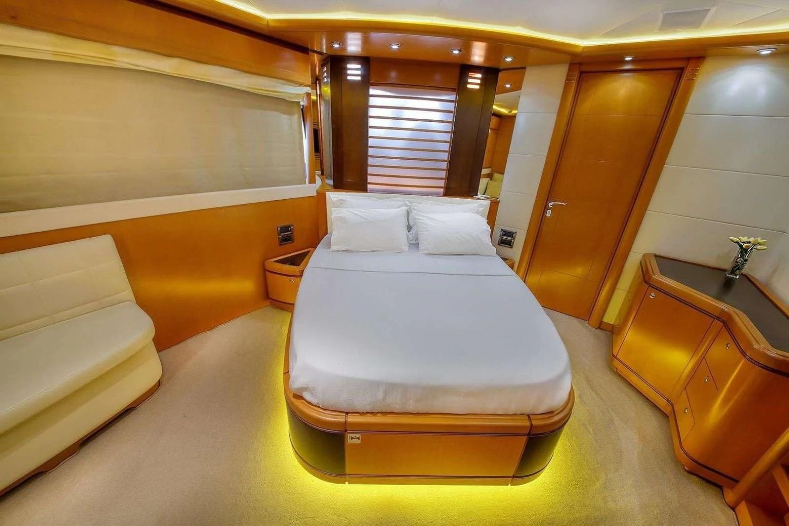 a bed in a room aboard ARIELA Yacht for Sale