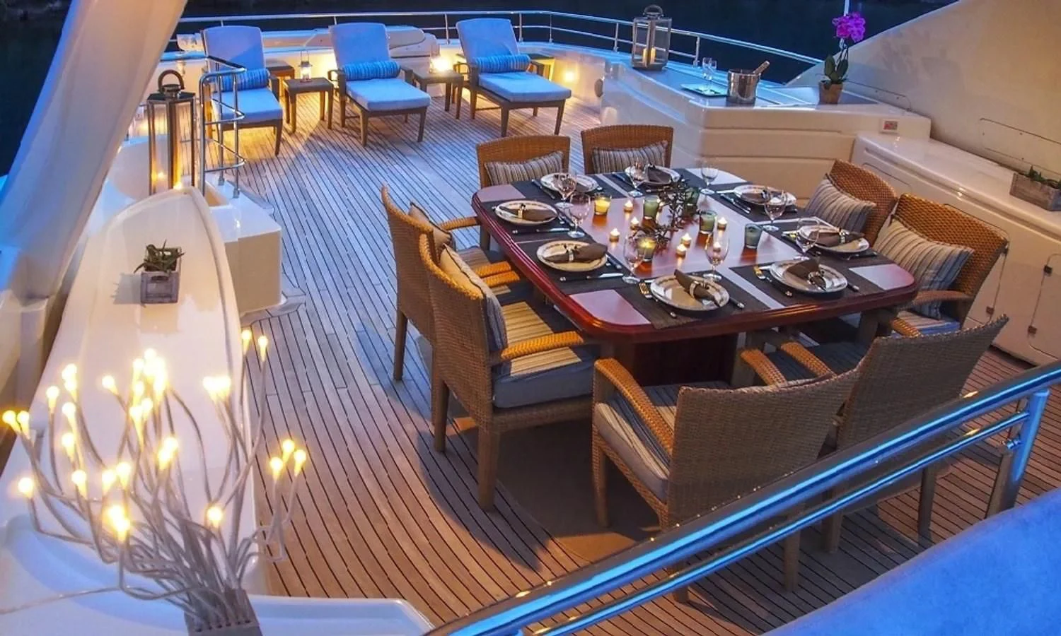 a dining room with a table and chairs aboard ARIELA Yacht for Sale