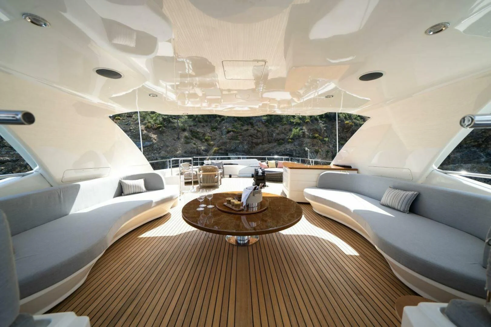 a room with a table and chairs aboard ARIELA Yacht for Sale