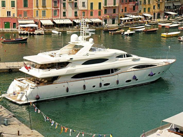 a boat docked at a pier aboard ARIELA Yacht for Sale