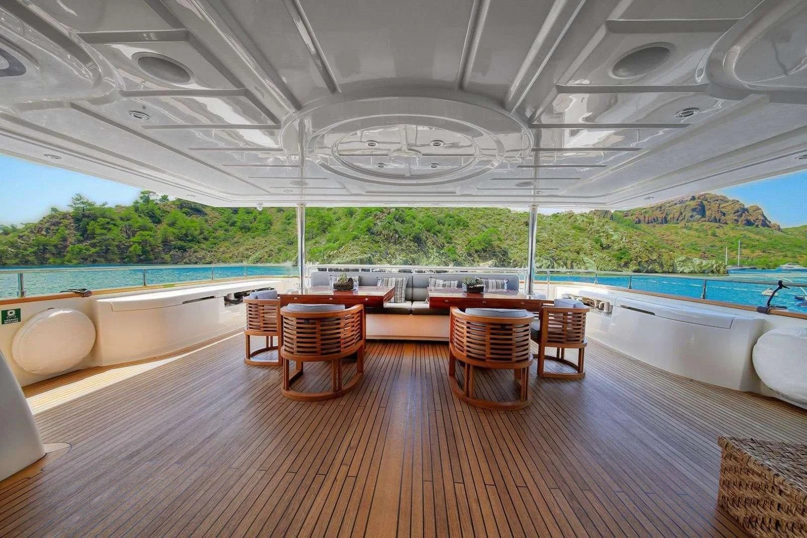 a room with a table and chairs aboard ARIELA Yacht for Sale