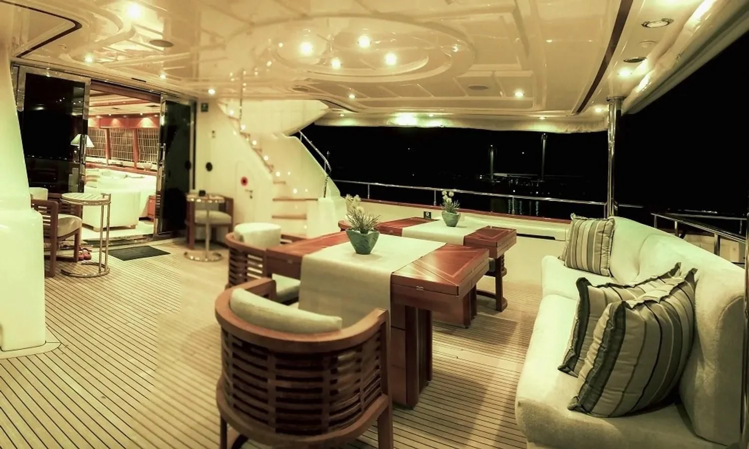 a room with a table and chairs aboard ARIELA Yacht for Sale