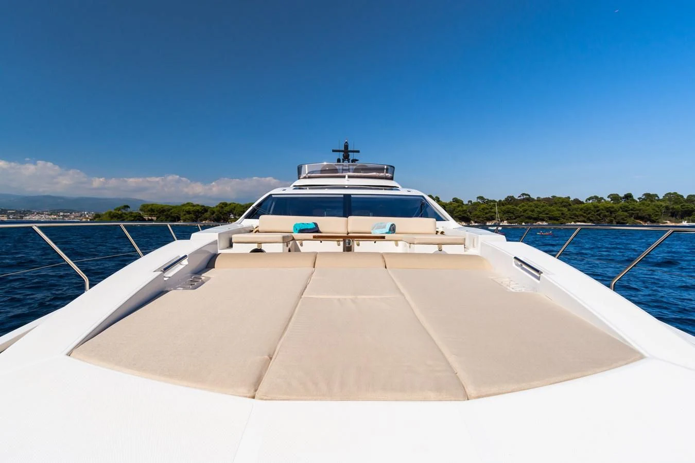 a white boat on a dock aboard YACHTI ANA Yacht for Sale