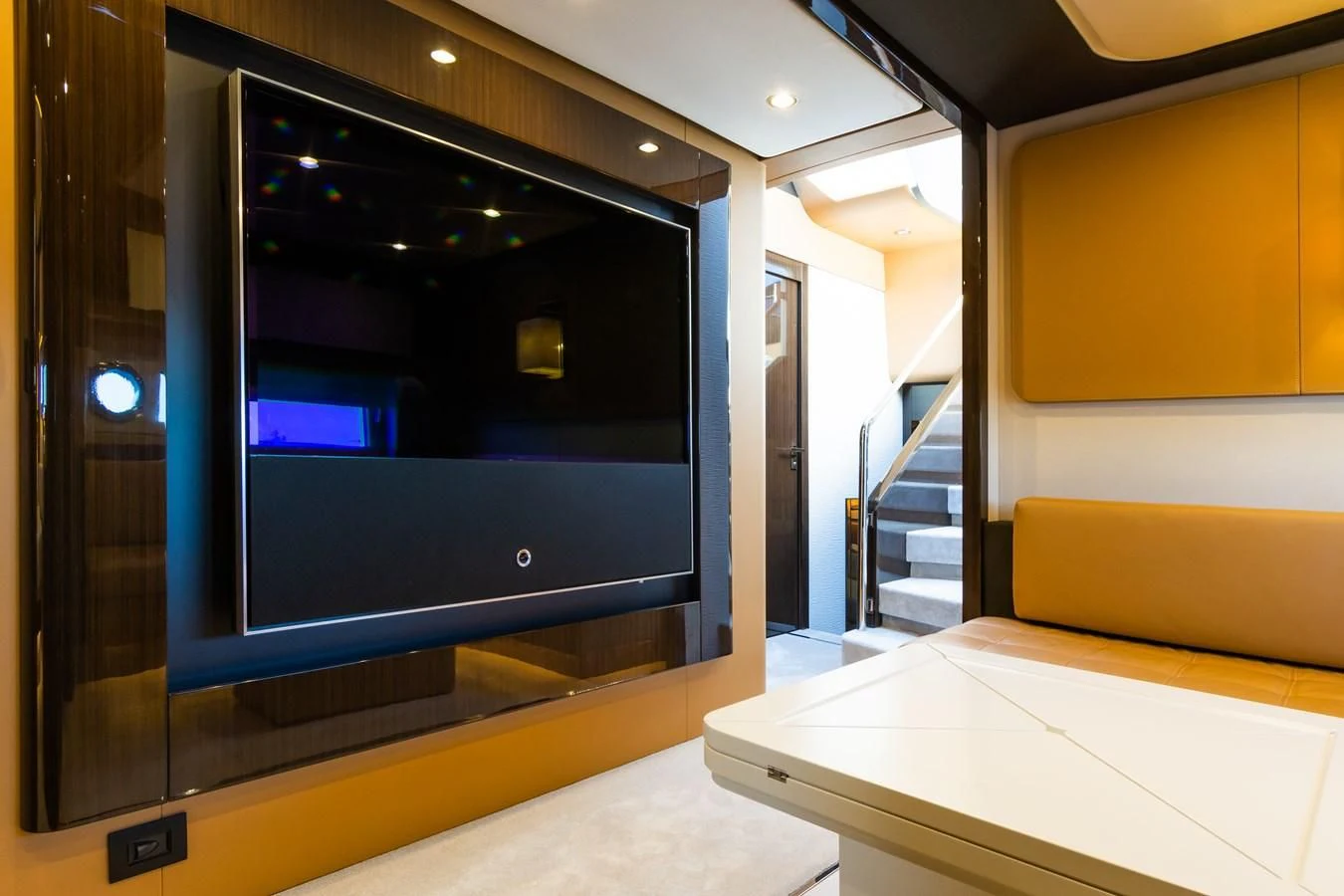 a large black screen in a room aboard YACHTI ANA Yacht for Sale
