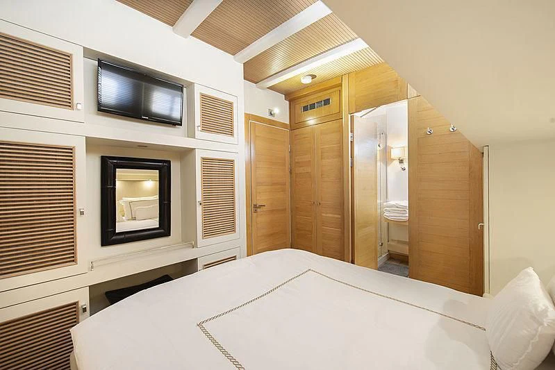 a bed in a room aboard COBRA KING Yacht for Sale