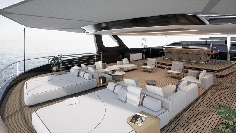a large modern room with a large bed and a large white couch aboard SEAWOLF X Yacht for Sale