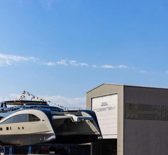 a boat parked next to a building aboard SEAWOLF X Yacht for Sale