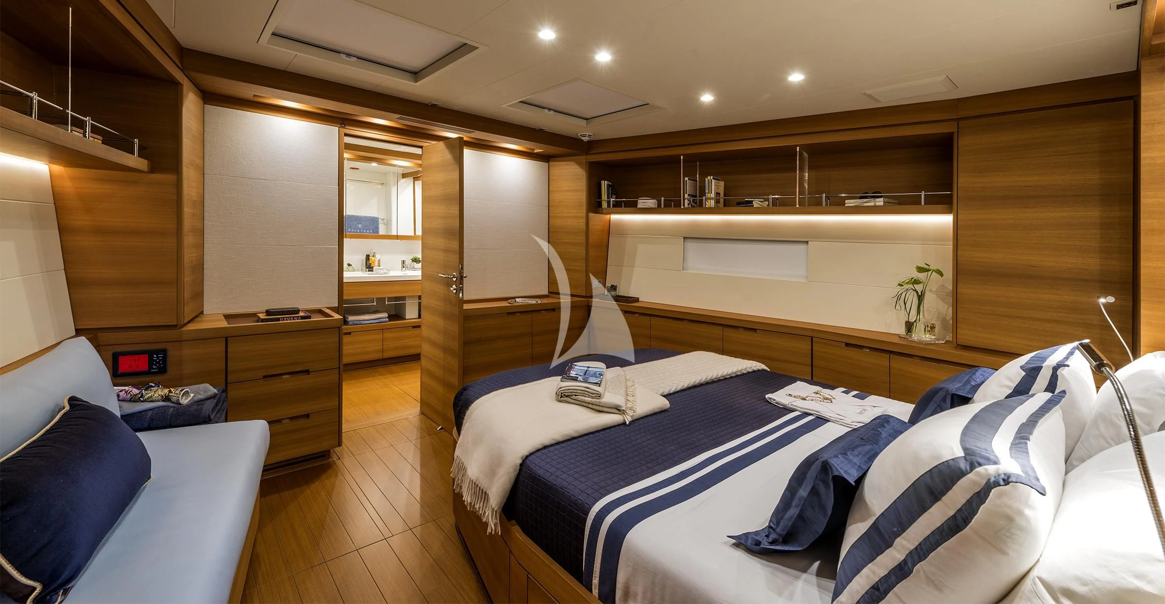 a room with a bed and a desk aboard FARFALLA Yacht for Sale