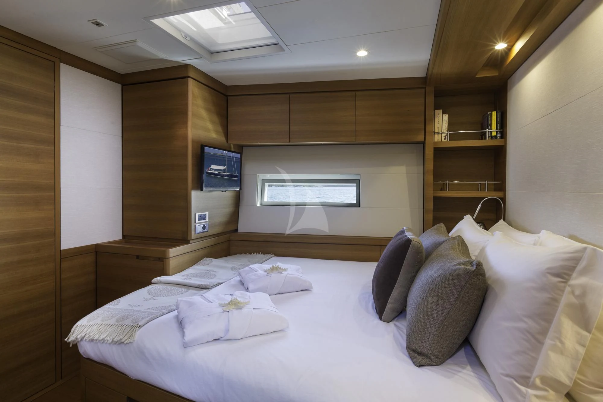 a bed in a room aboard FARFALLA Yacht for Sale