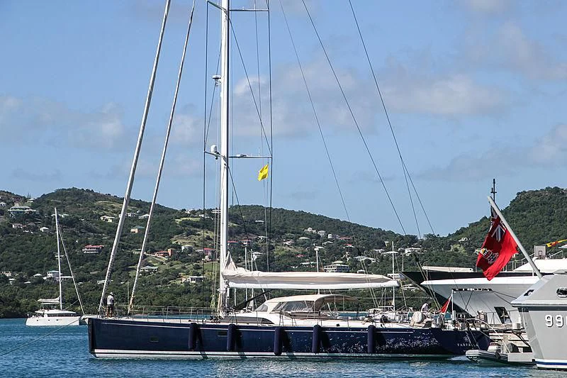 a boat docked at a pier aboard FARFALLA Yacht for Sale