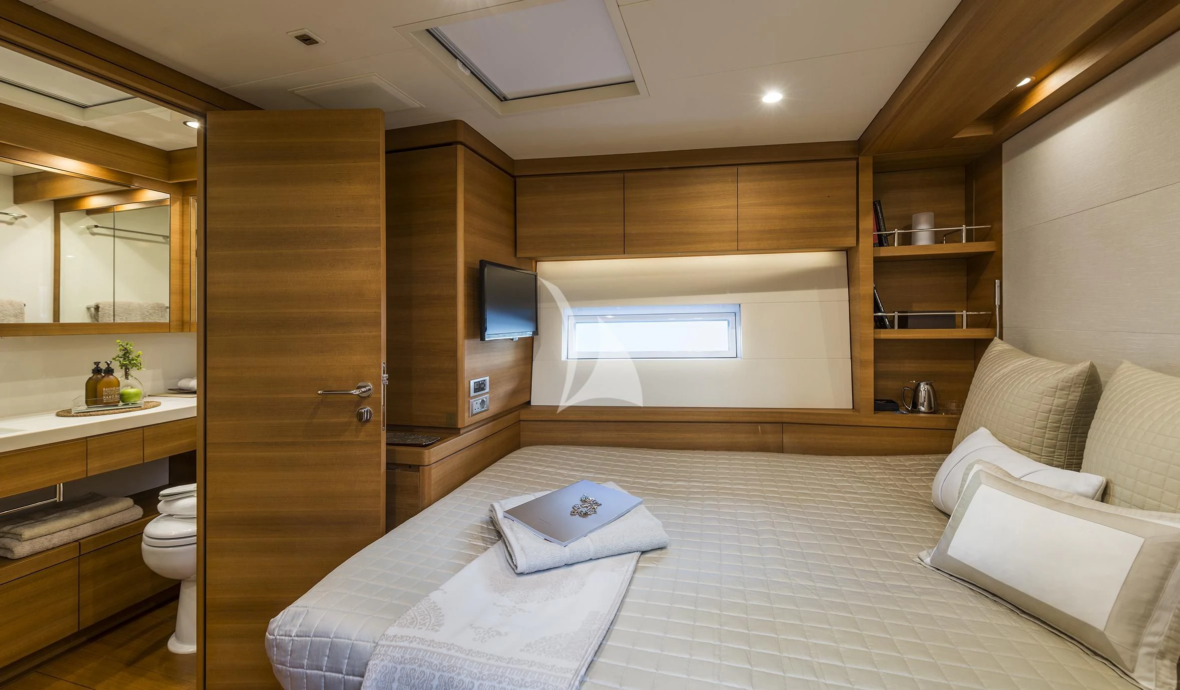 a room with a bed and a desk aboard FARFALLA Yacht for Sale