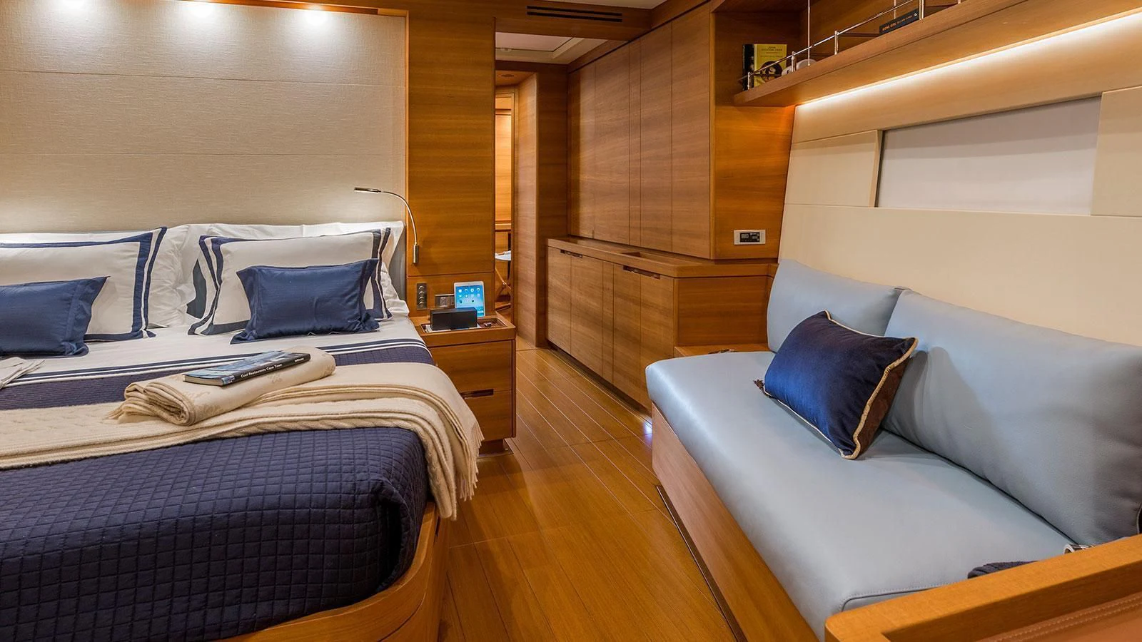 a room with a bed and a desk aboard FARFALLA Yacht for Sale