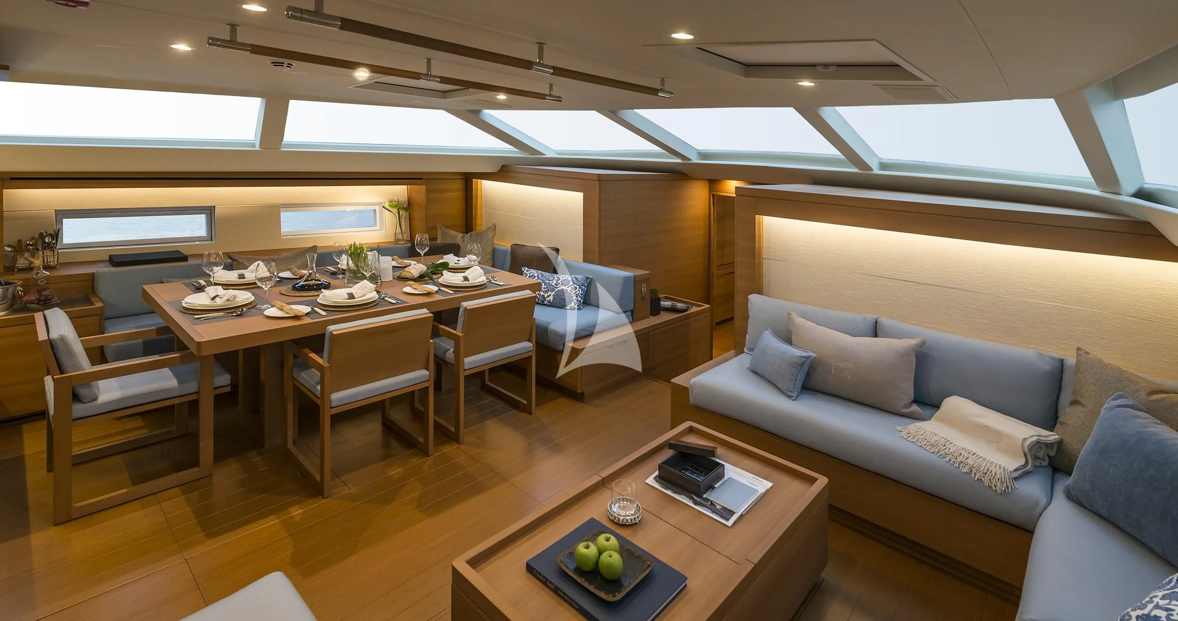a room with a couch and a table aboard FARFALLA Yacht for Sale