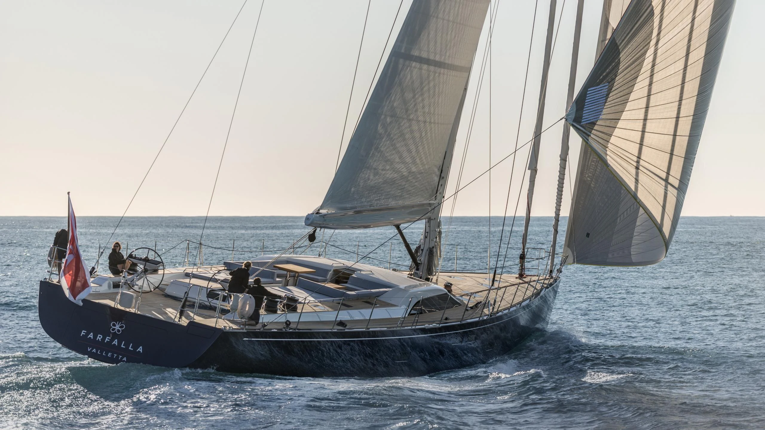 a group of people sailing on a sailboat aboard FARFALLA Yacht for Sale