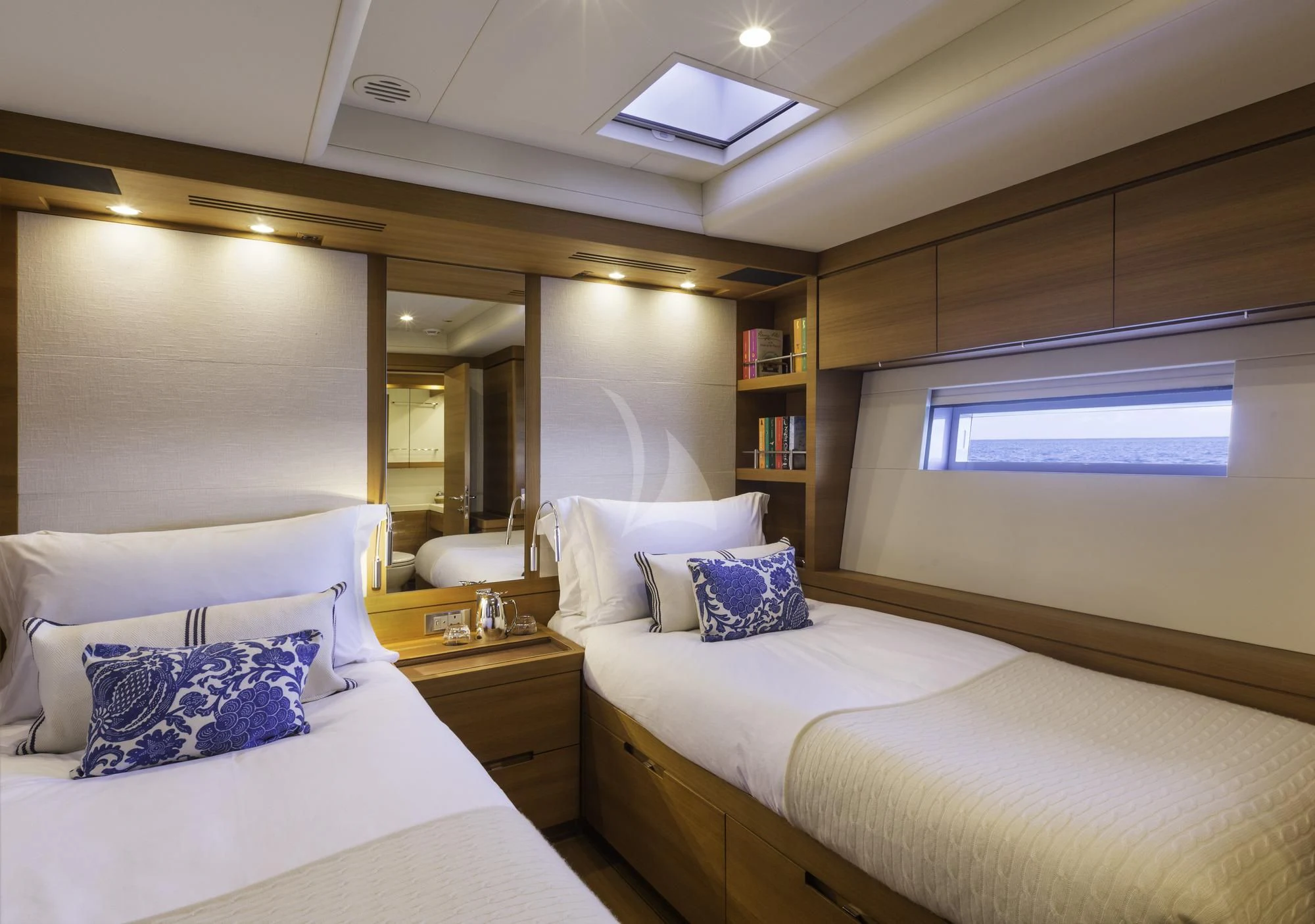 a room with two beds aboard FARFALLA Yacht for Sale