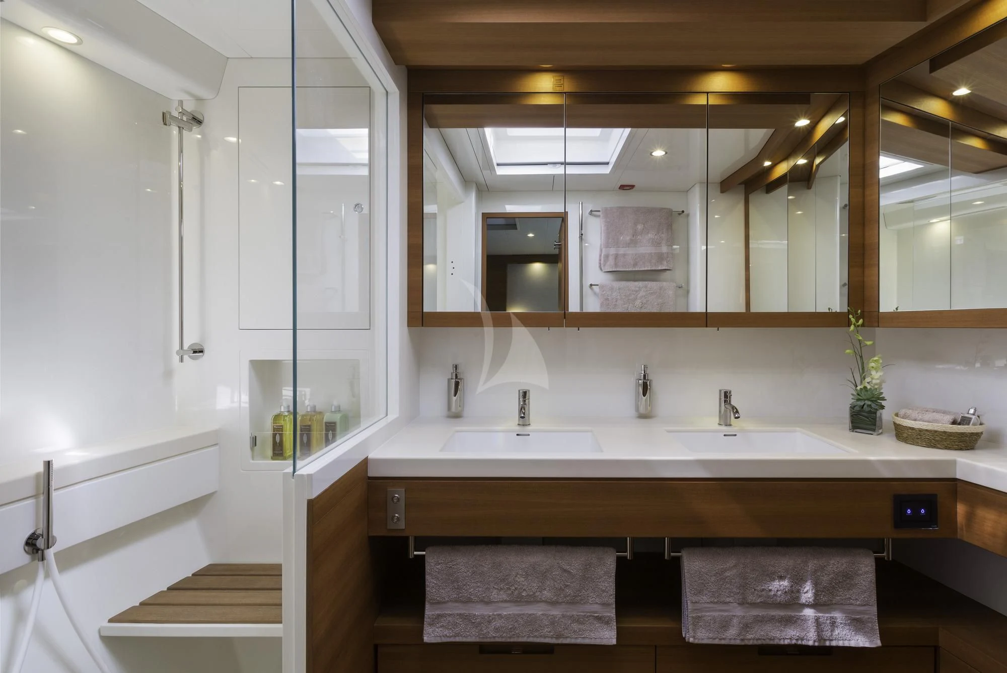 a bathroom with a large mirror aboard FARFALLA Yacht for Sale