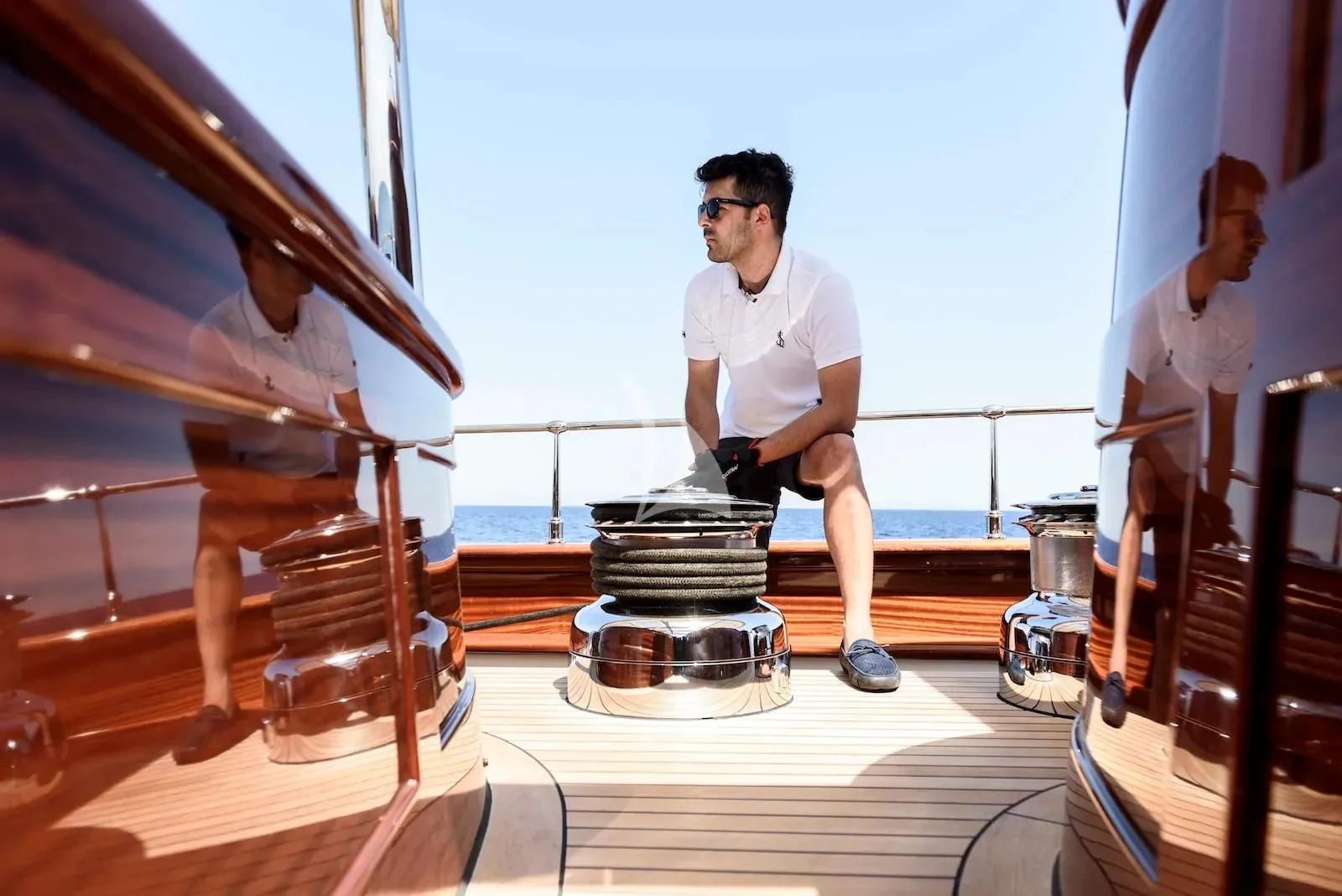 a man working on a machine aboard SALLYNA Yacht for Sale