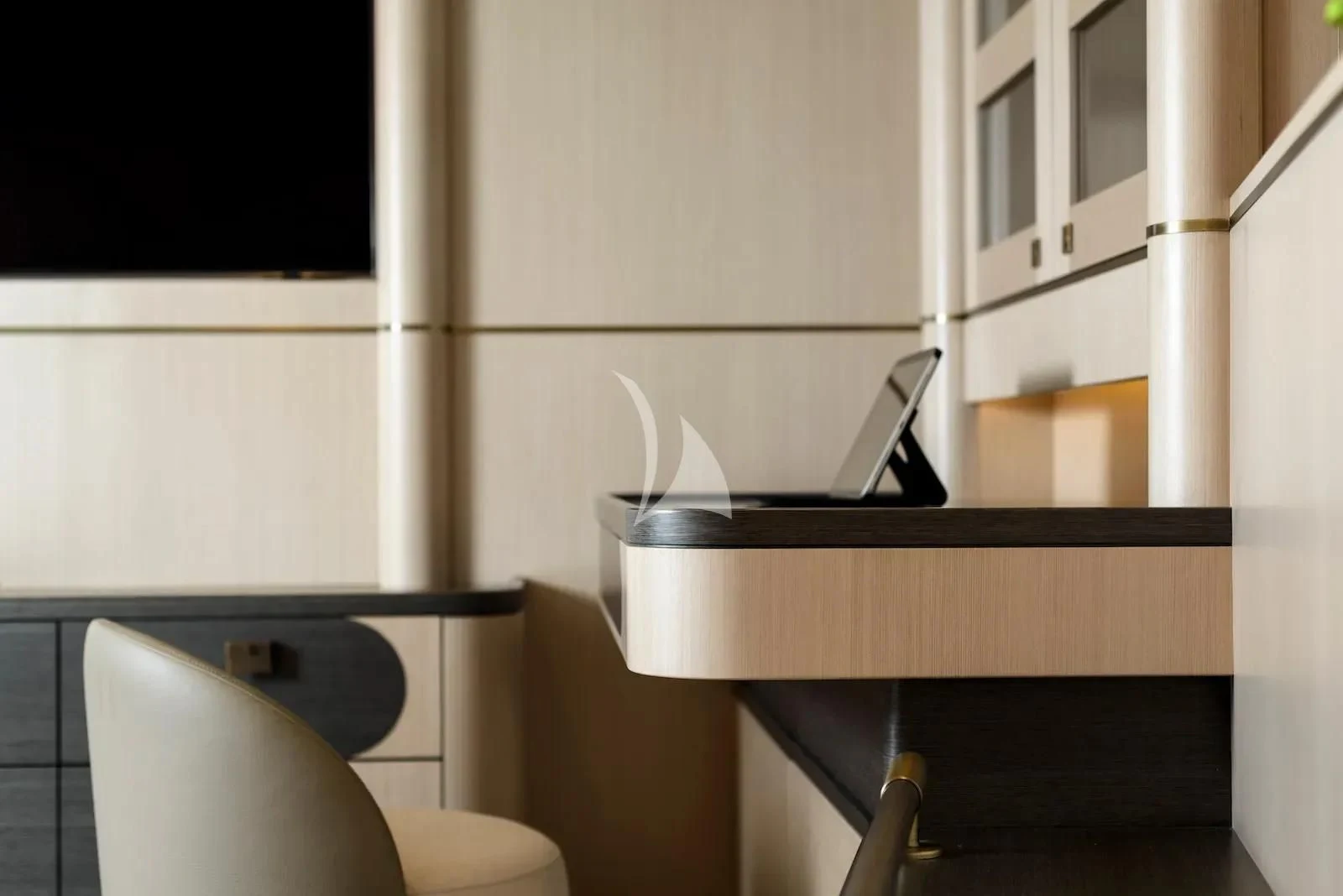 a chair and a desk in a room aboard SALLYNA Yacht for Sale