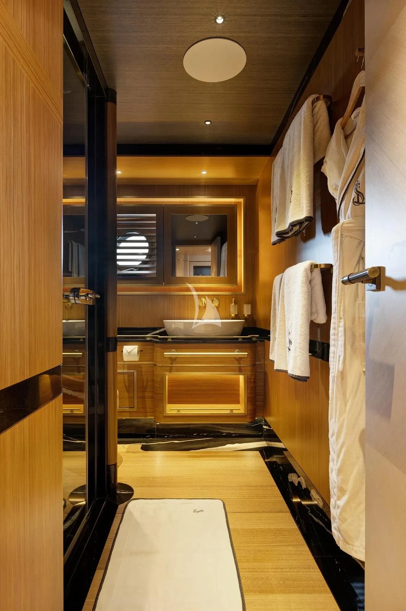 a bathroom with a sink and a mirror aboard SALLYNA Yacht for Sale