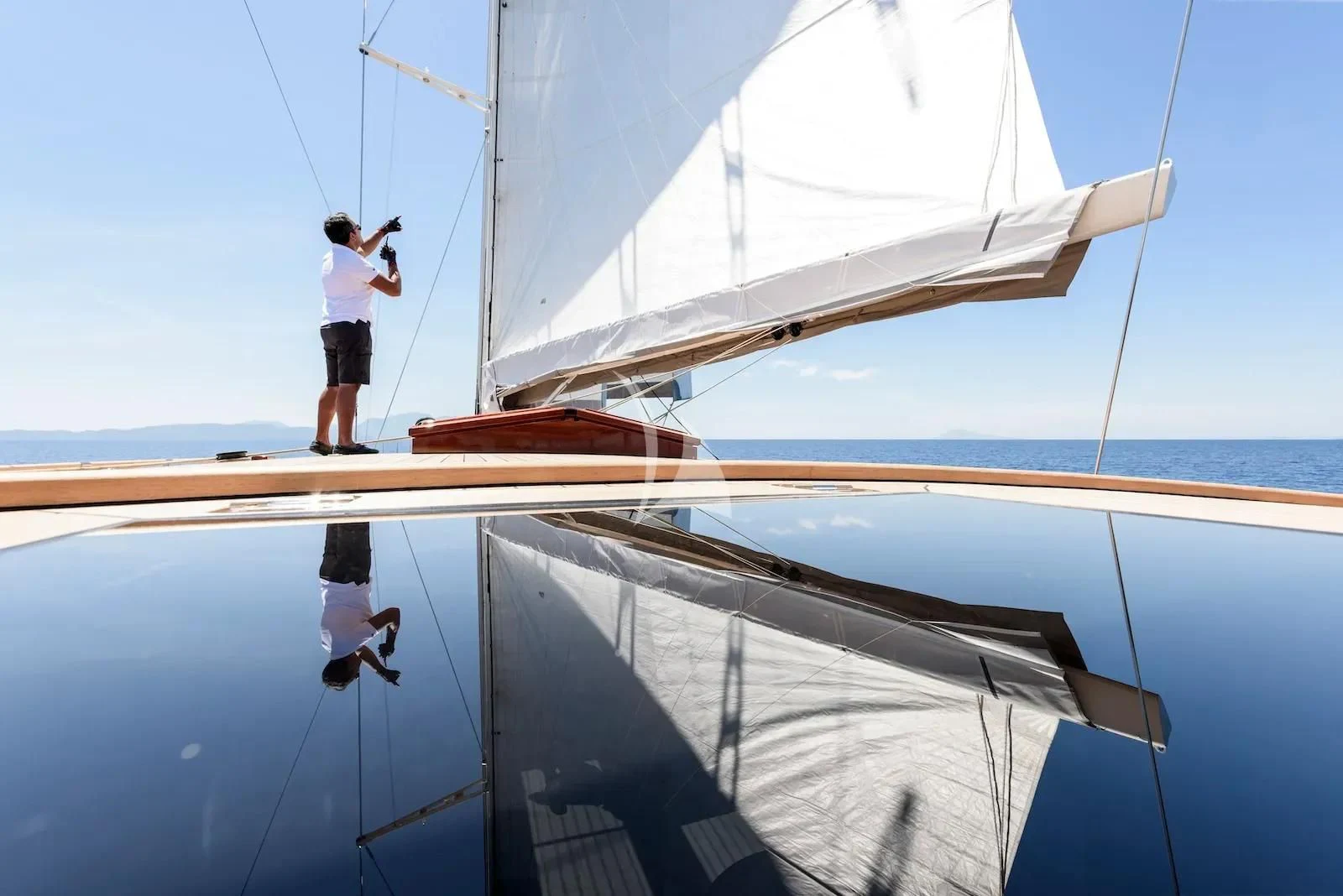 a person standing on a sailboat aboard SALLYNA Yacht for Sale