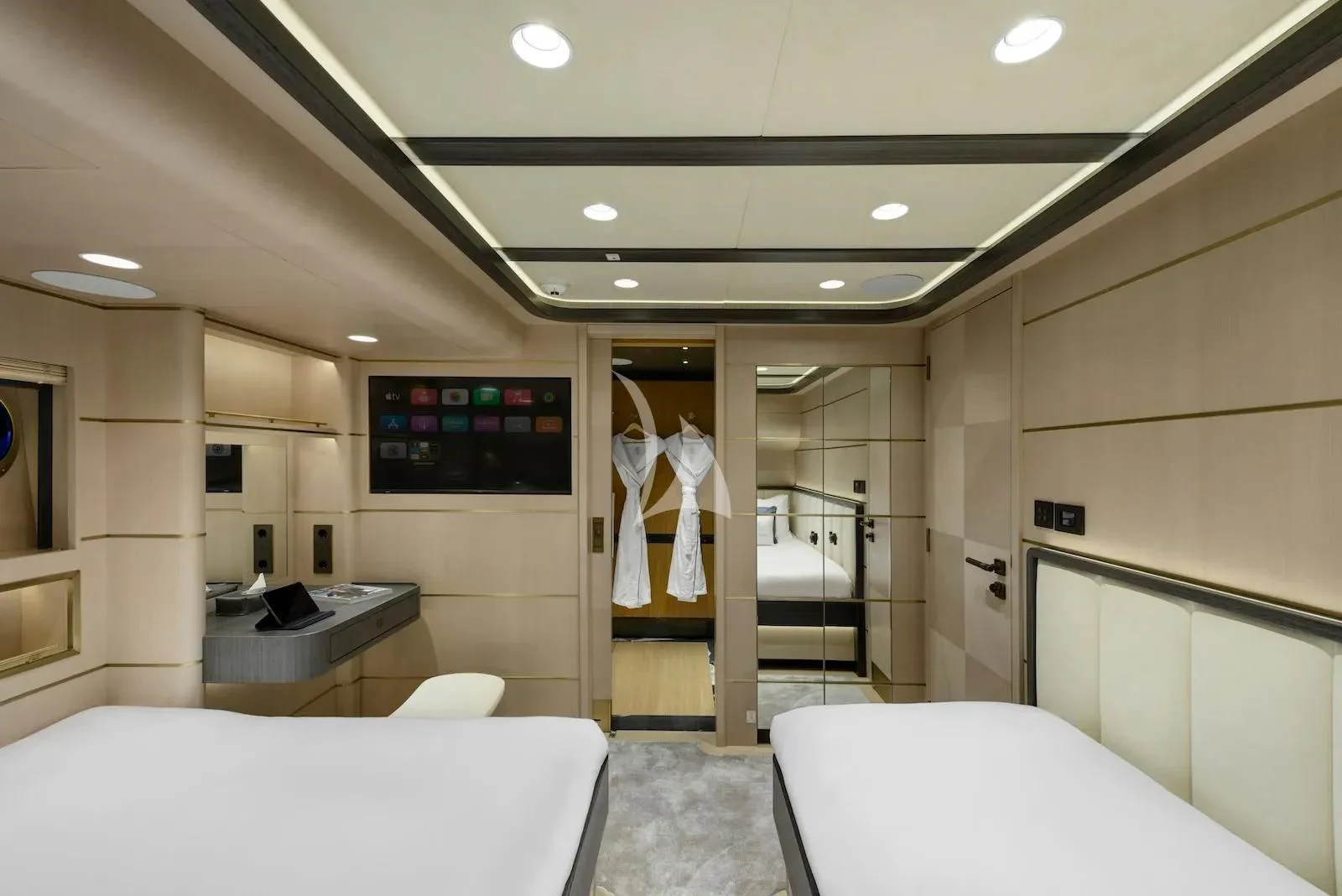 a room with a bed and a television on the wall aboard SALLYNA Yacht for Sale